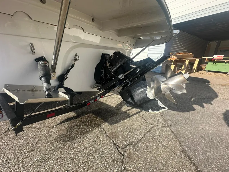 Slide: The Image of Rear view of a 2007 Crownline 260 LS boat with propeller and trailer. - 8