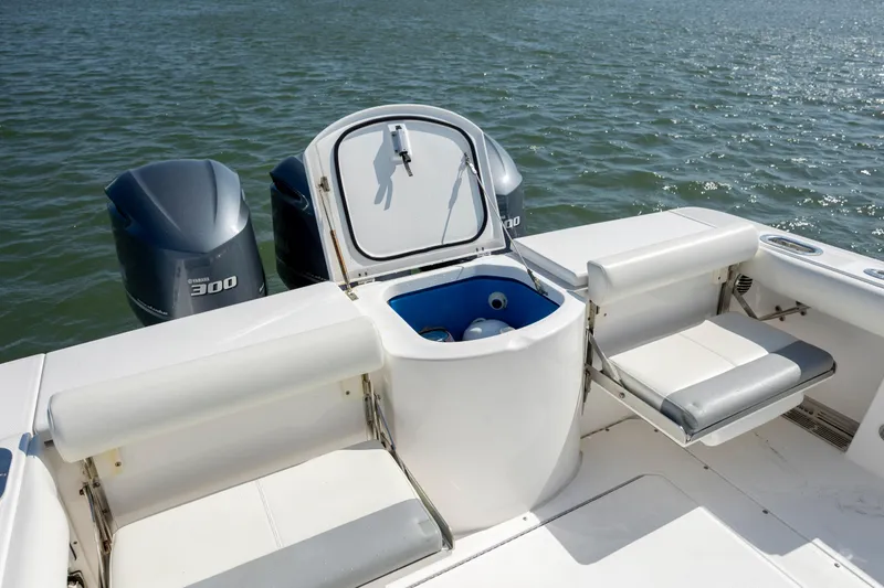 Slide: The Image of 2017 Everglades 355 Tournament boat with dual engines and seating, on water. - 15