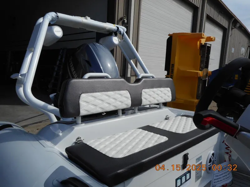 Slide: The Image of 2025 Highfield Sport 420 boat interior with cushioned seating and modern design. - 6