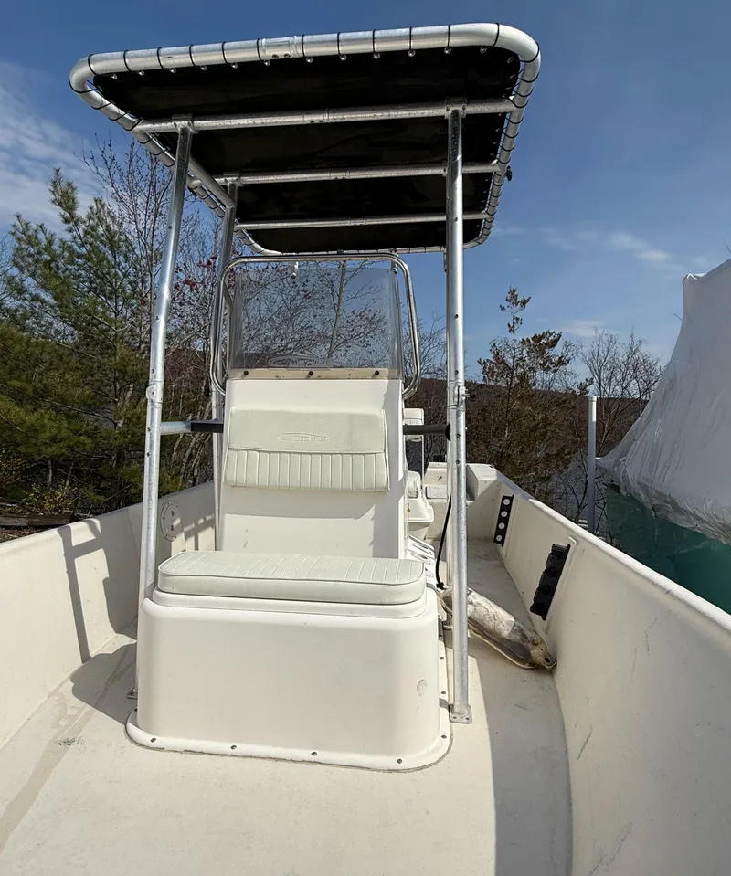 Slide: The Image of 2010 May-Craft 1800 Skiff boat with T-top, viewed from the deck. - 10