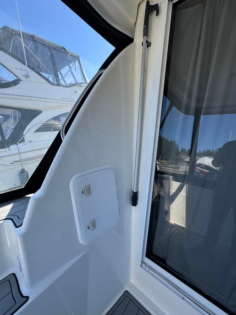 Slide: The Image of 2003 Meridian 381 Sedan boat interior with sleek design and modern features. - 10