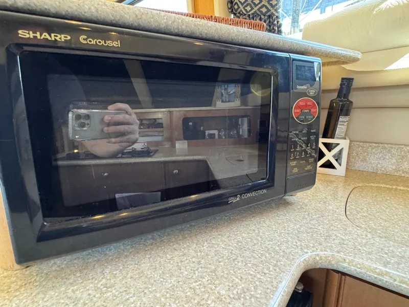 Slide: The Image of Sharp Carousel microwave in 2003 Meridian 381 Sedan kitchen interior. - 22