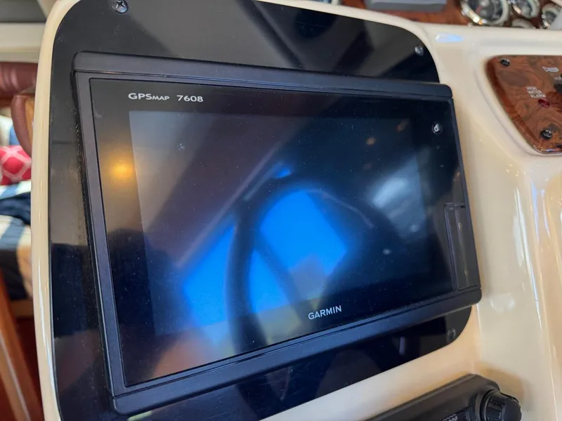 Slide: The Image of Garmin GPSMAP 7608 on 2003 Meridian 381 Sedan dashboard. - 32