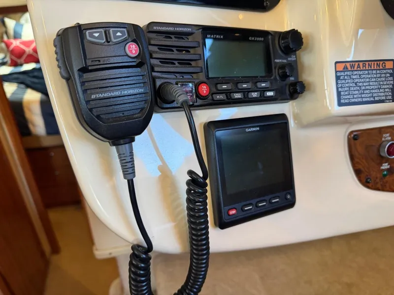 Slide: The Image of Control panel of a 2003 Meridian 381 Sedan with radio and navigation equipment. - 33