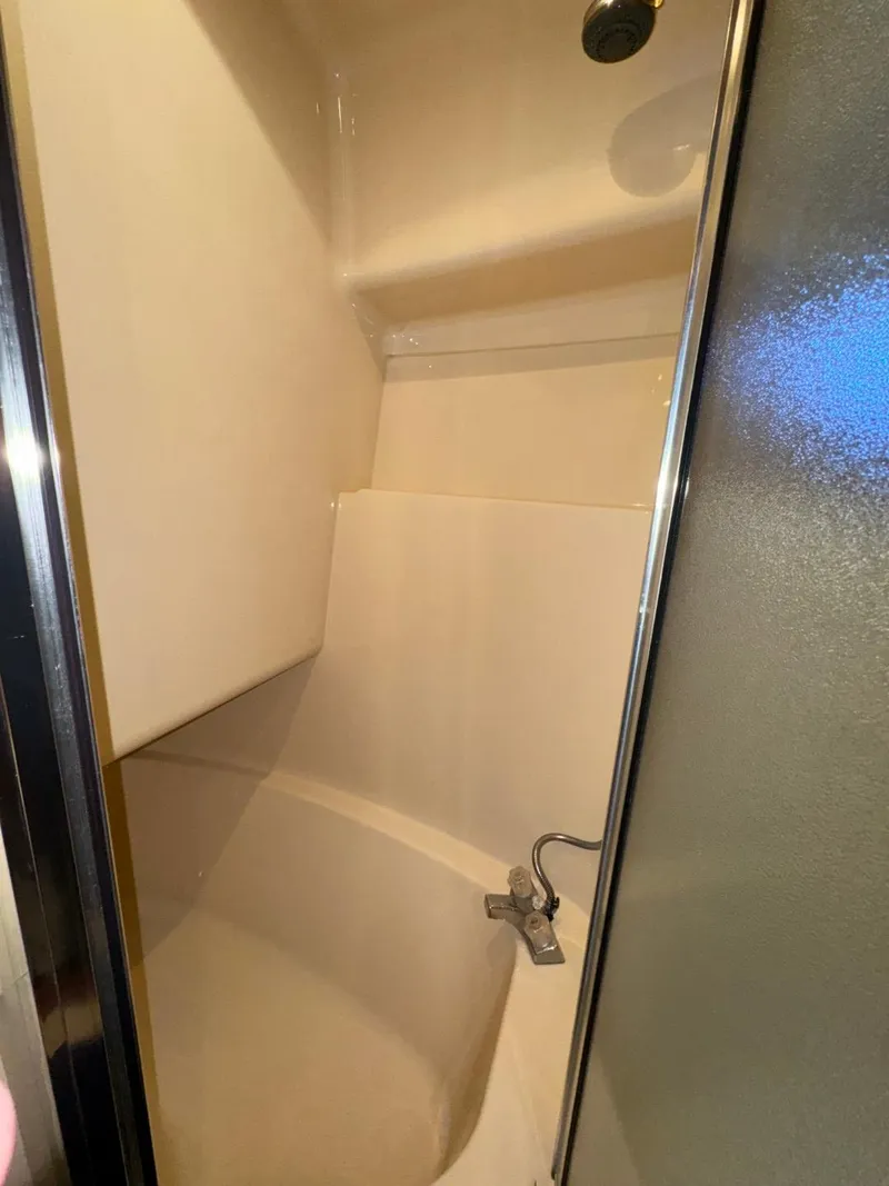 Slide: The Image of Shower area inside a 2003 Meridian 381 Sedan boat. - 39