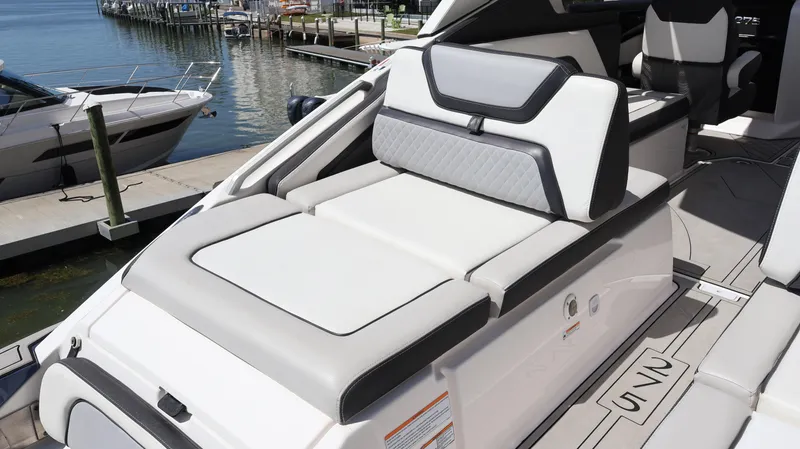 Slide: The Image of 2020 Yamaha Boats 275 SD luxury seating area by the dock. - 10