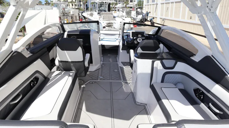 Slide: The Image of 2020 Yamaha Boats 275 SD interior, featuring sleek seating and modern design elements. - 18