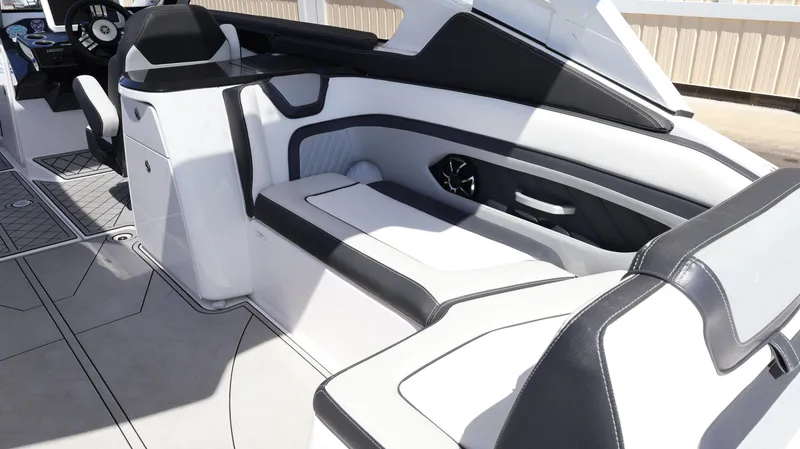 Slide: The Image of 2020 Yamaha Boats 275 SD interior with sleek seating and modern design. - 19
