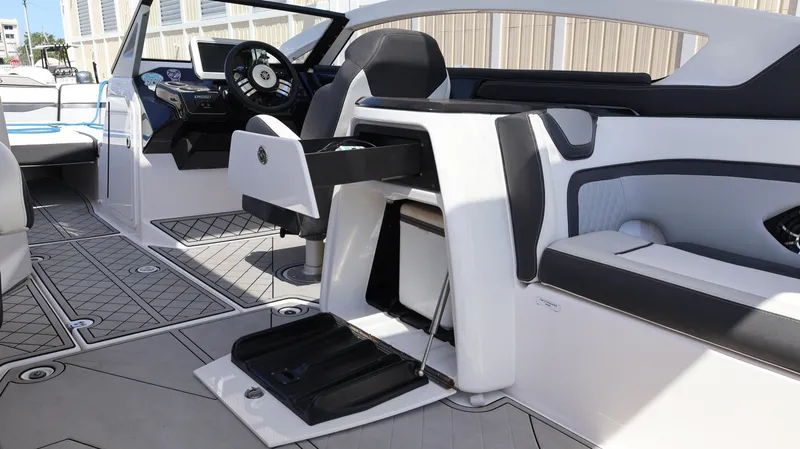 Slide: The Image of 2020 Yamaha Boats 275 SD interior with modern seating and steering wheel. - 24