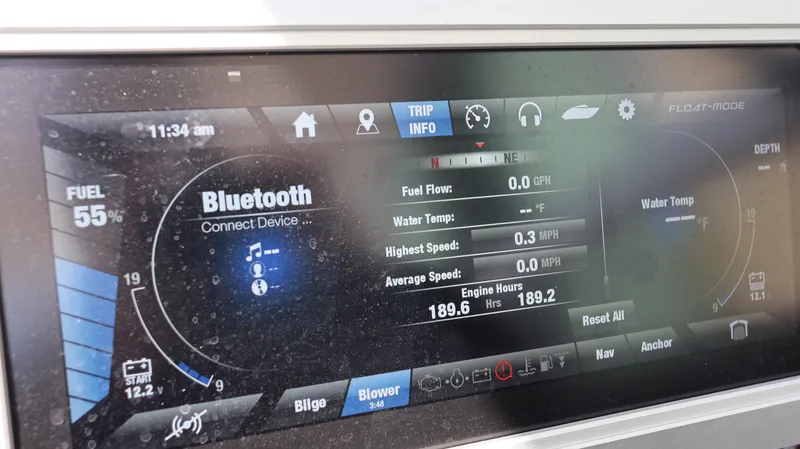 Slide: The Image of 2020 Yamaha Boats 275 SD dashboard display showing Bluetooth connectivity and trip information. - 32