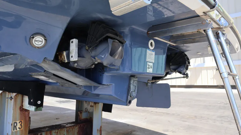 Slide: The Image of 2020 Yamaha Boats 275 SD stern view, showcasing dual jet propulsion system. - 43