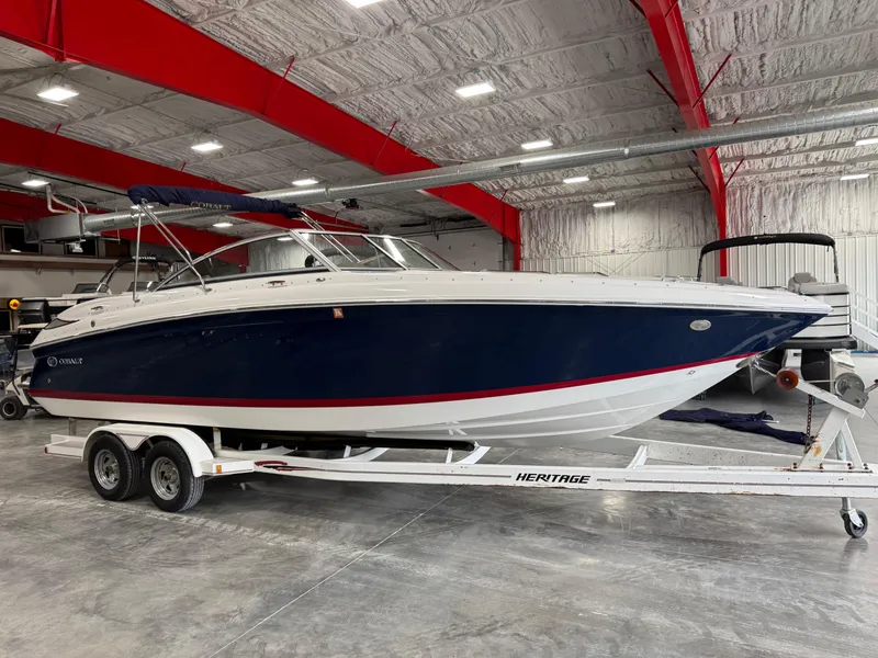 Slide: The Image of 2012 Cobalt 262 BR boat on trailer in indoor storage facility. - 2