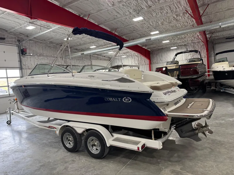 Slide: The Image of 2012 Cobalt 262 BR boat on trailer in indoor showroom. - 4
