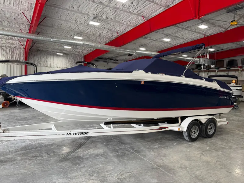 Slide: The Image of 2012 Cobalt 262 BR boat on trailer in indoor storage facility. - 6