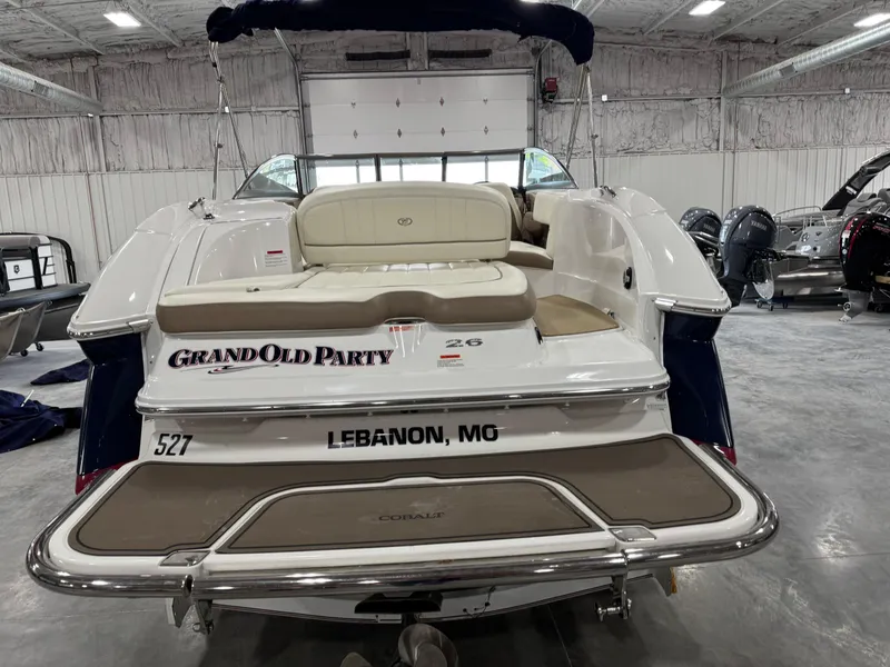 Slide: The Image of 2012 Cobalt 262 BR boat in a garage, labeled "Grand Old Party," Lebanon, MO. - 7