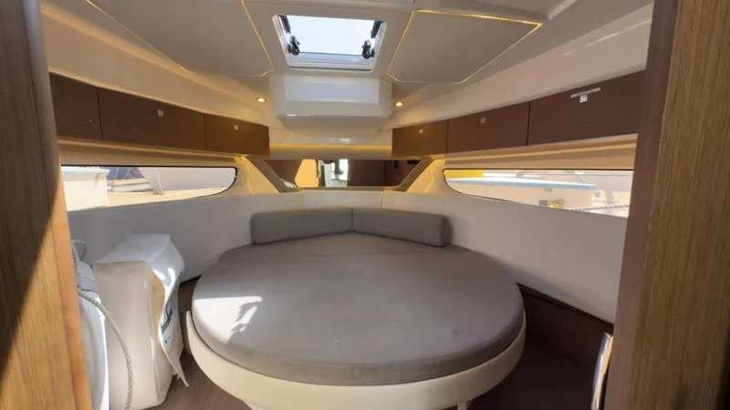Slide: The Image of 2019 Jeanneau NC Weekender 1095 cabin with round bed and skylight. - 15