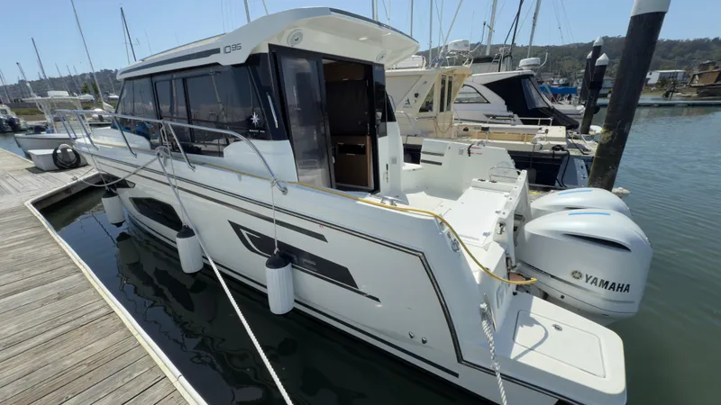 Slide: The Image of 2019 Jeanneau NC Weekender 1095 boat docked with Yamaha engines. - 3