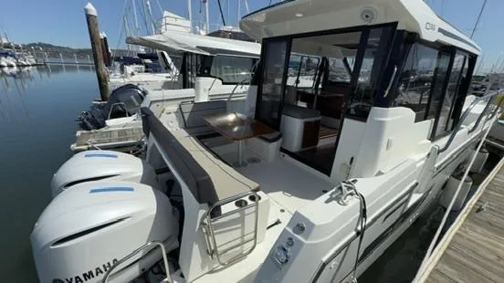 Slide: The Image of 2019 Jeanneau NC Weekender 1095 docked with twin Yamaha engines. - 7