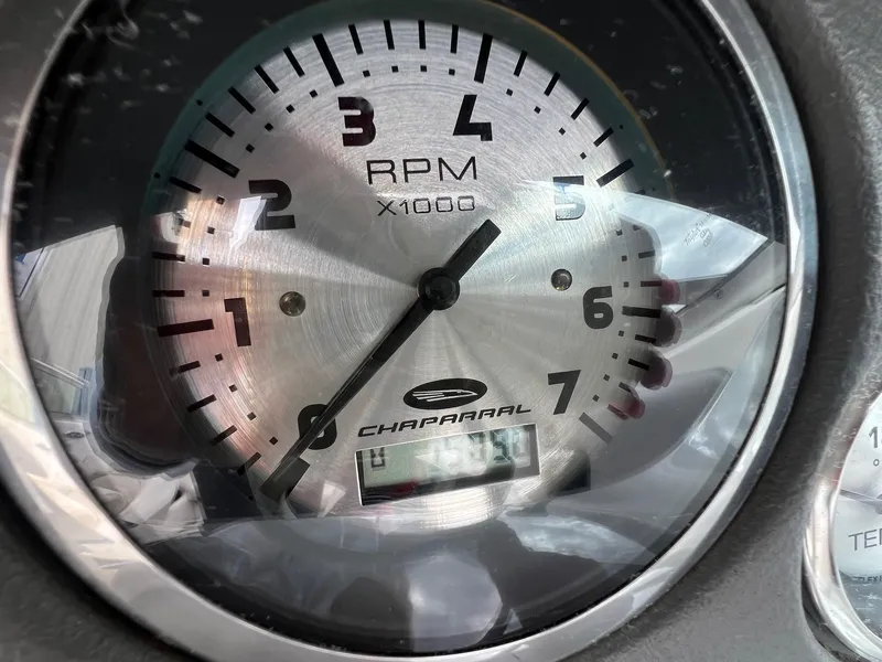 Slide: The Image of Tachometer of 2004 Chaparral 210 SSi boat, displaying RPM readings. - 24
