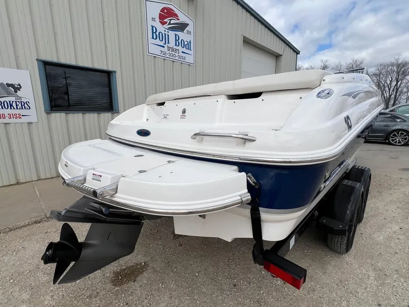 Slide: The Image of 2004 Chaparral 210 SSi boat on trailer outside Boji Boat Brokers building. - 8