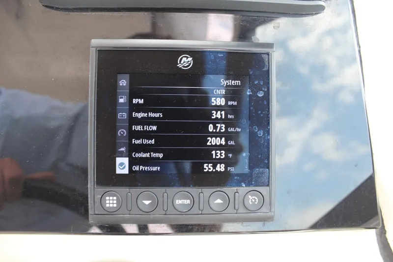 Slide: The Image of Digital display on 2021 Boston Whaler 240 Vantage showing engine metrics. - 31