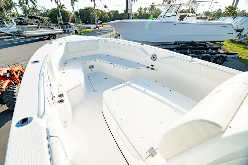 Slide: The Image of 2024 Edgewater 340CC boat interior with spacious seating and sleek design. - 45