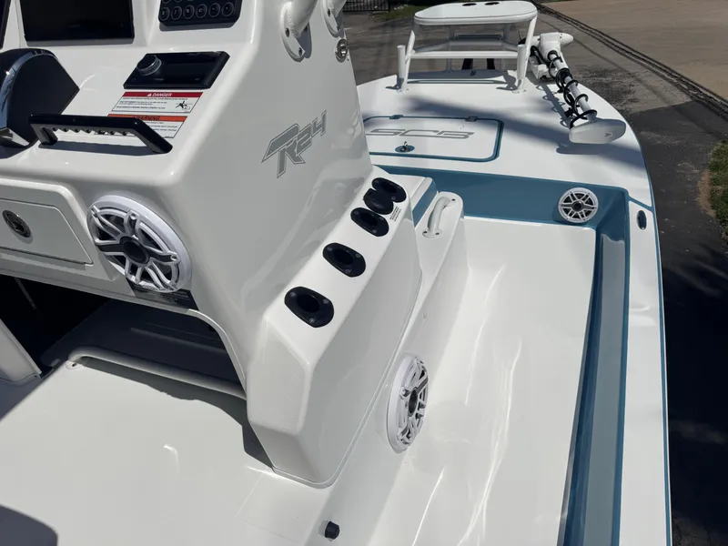 Slide: The Image of 2025 SCB R24 boat deck with speakers and control panel. - 10