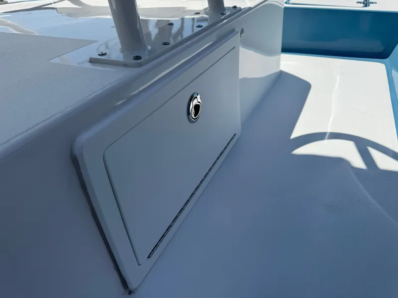 Slide: The Image of 2025 SCB R24 boat storage compartment with lock, featuring sleek design and durable construction. - 18