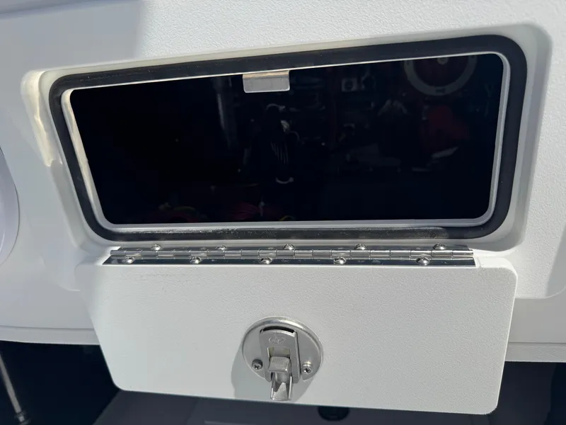 Slide: The Image of 2025 SCB R24 storage compartment with secure latch, featuring a sleek design. - 9