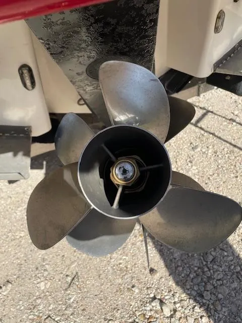 Slide: The Image of Propeller of 2006 Chaparral 256 SSi boat on gravel surface. - 3