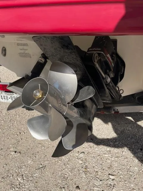 Slide: The Image of Propeller of a 2006 Chaparral 256 SSi boat on a gravel surface. - 4