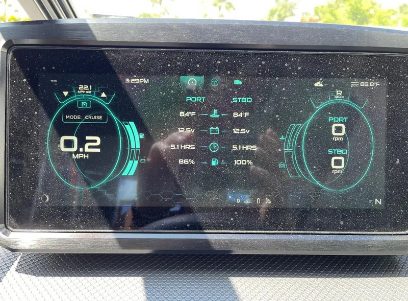 Slide: The Image of Dashboard display of 2023 Scarab 285 ID showing speed, temperature, and battery status. - 6