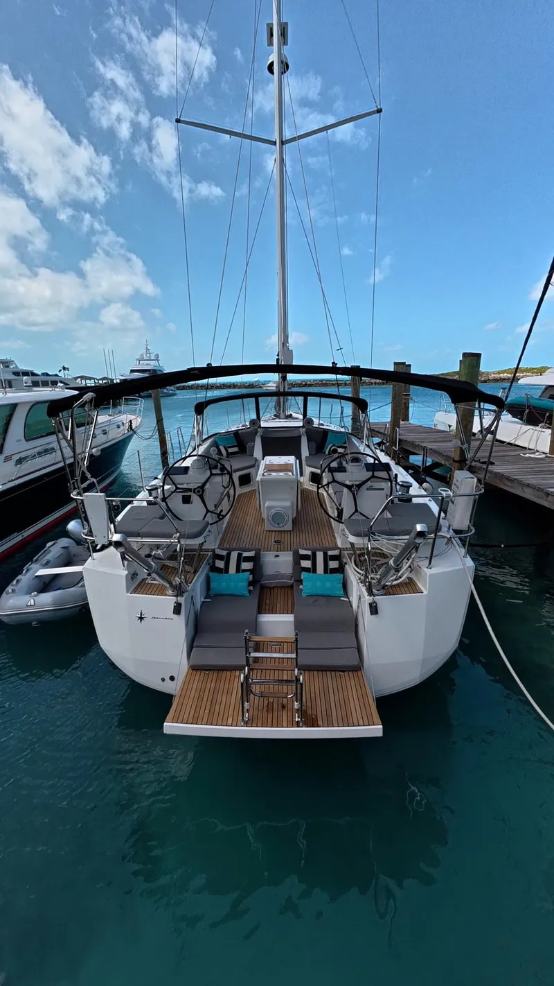 Slide: The Image of Luxurious interior of 2021 Jeanneau 54 yacht with cozy bed and seating area. - 14