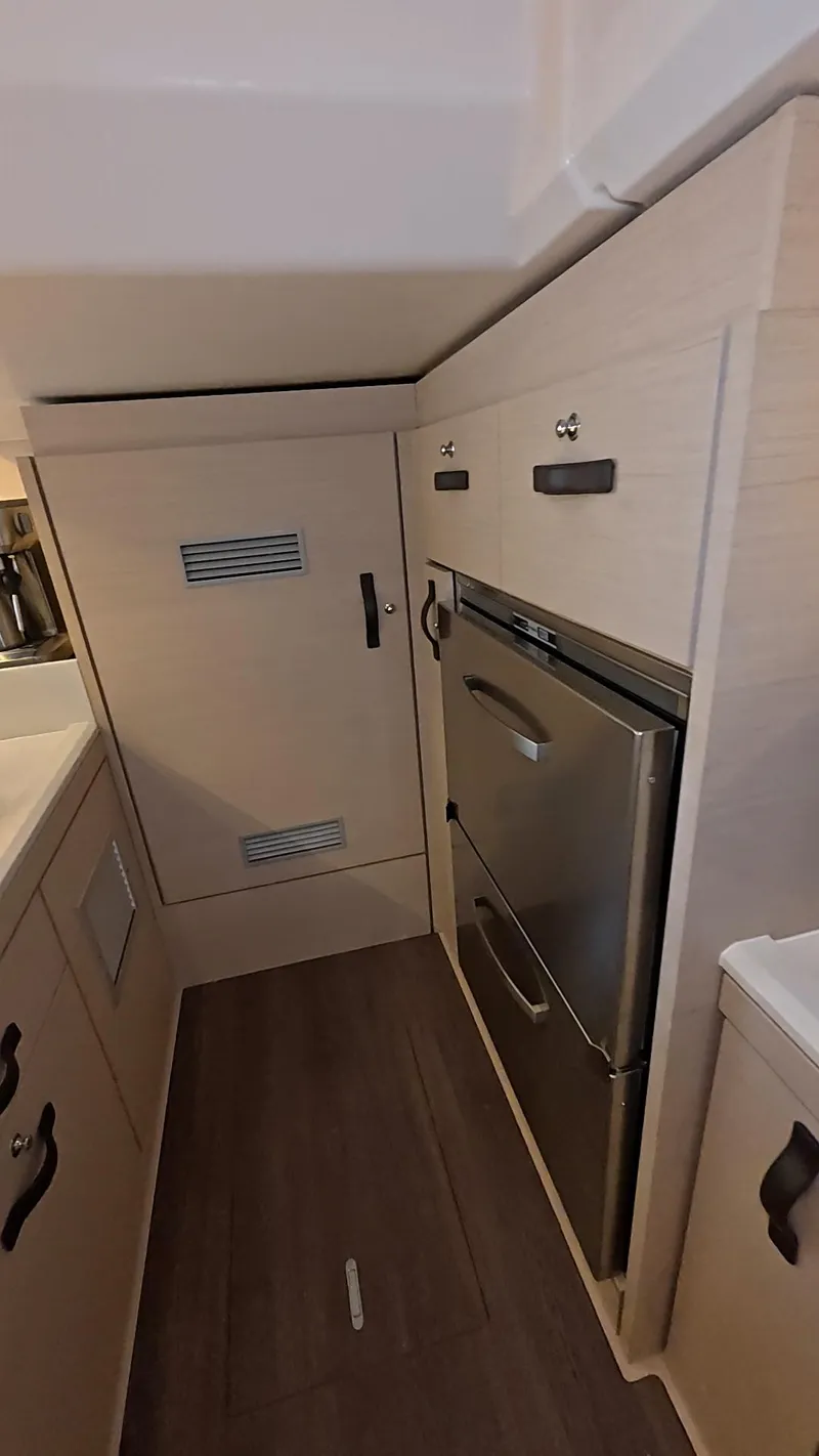 Slide: The Image of Luxurious interior of a 2021 Jeanneau 54 yacht with elegant seating and modern decor. - 25