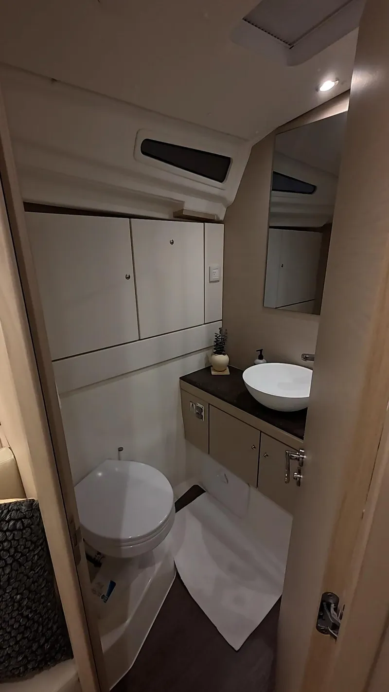 Slide: The Image of 2021 Jeanneau 54 yacht bathroom with modern fixtures and elegant design. - 33