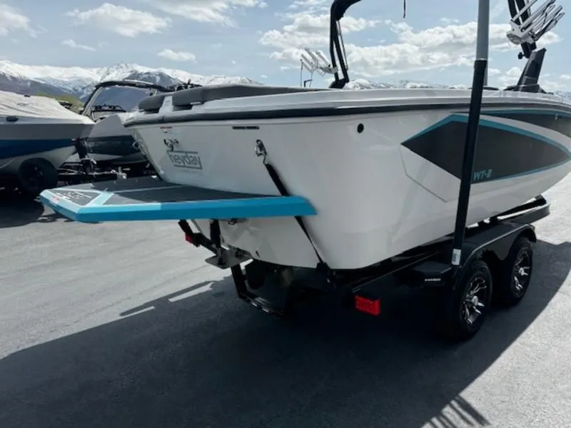 Slide: The Image of 2018 Heyday WT-2 boat on trailer, rear view, with mountains in background. - 6