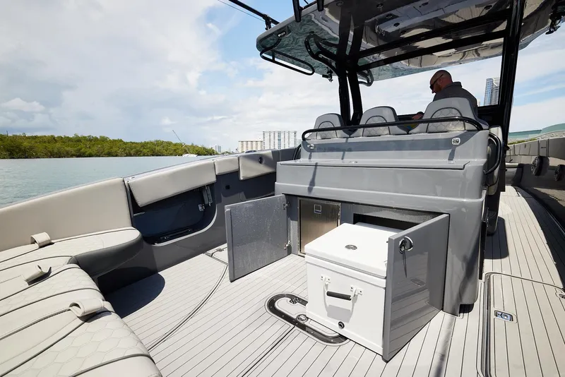 Slide: The Image of 2025 Midnight Express 43' Open boat interior with seating and storage compartments. - 14