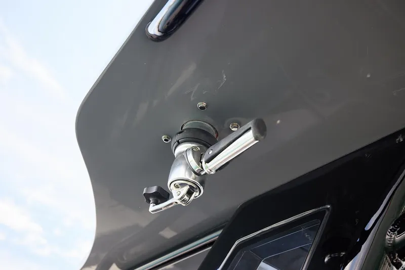Slide: The Image of Close-up of a 2025 Midnight Express 43' Open boat's control lever. - 15