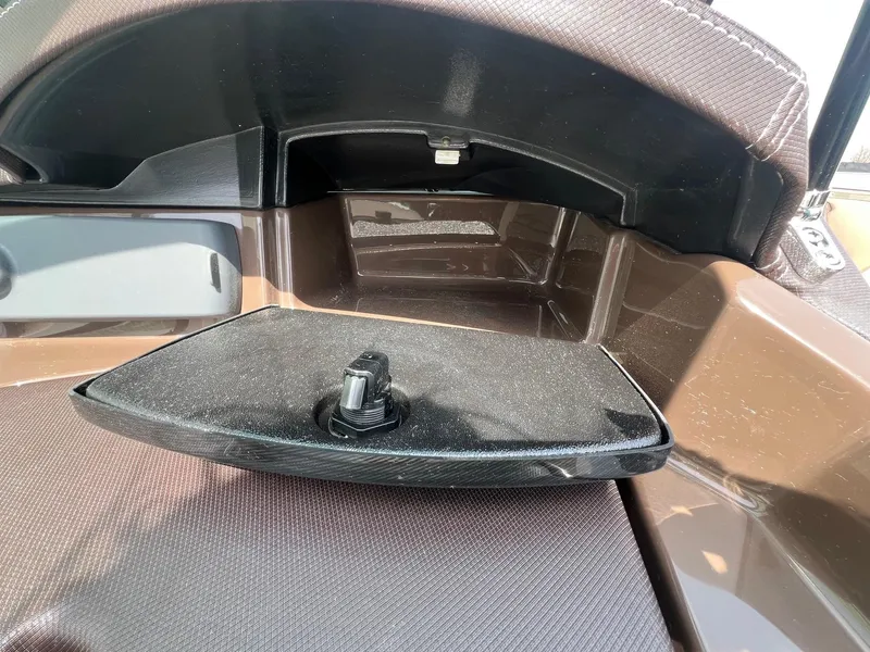 Slide: The Image of 2015 Monterey 218 Super Sport dashboard detail with black panel and knob. - 21