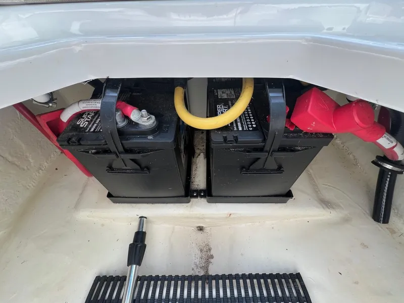 Slide: The Image of Batteries in a 2015 Monterey 218 Super Sport boat compartment. - 30