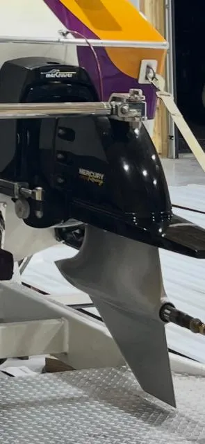 Slide: The Image of Close-up of a 1999 Skater 32B boat engine with Mercury branding. - 5