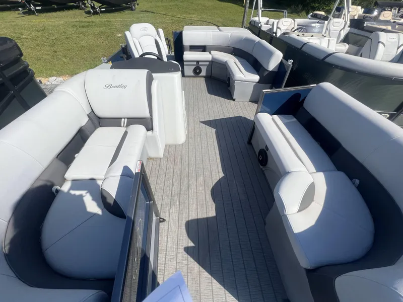 Slide: The Image of 2024 Bentley Pontoons Legacy 200 Cruise interior with spacious seating and modern design. - 6
