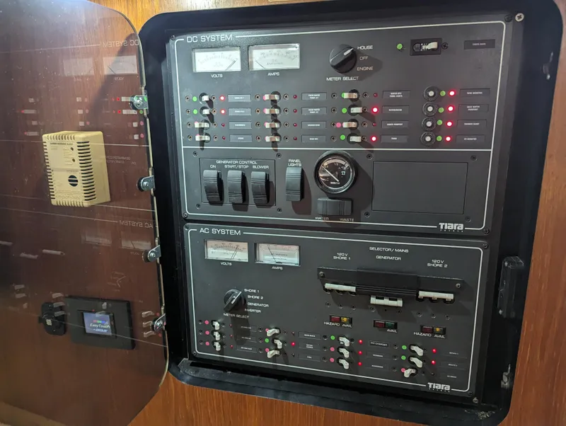 Slide: The Image of Electrical control panel on a 2000 Tiara Yachts 3500 Express boat. - 17