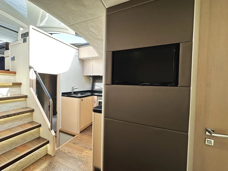 Slide: The Image of Interior of 2015 Sunseeker Predator 57 yacht with modern kitchen and staircase. - 29