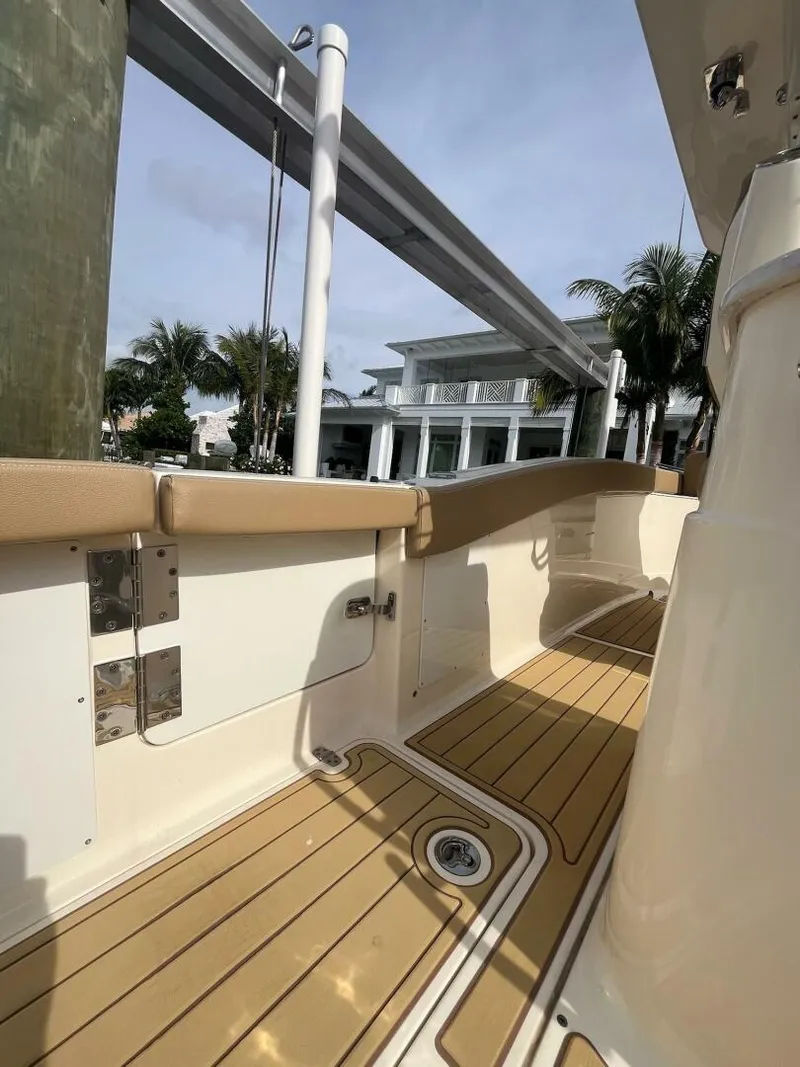 Slide: The Image of 2020 Scout 277LXF boat deck with tan accents and modern design. - 16