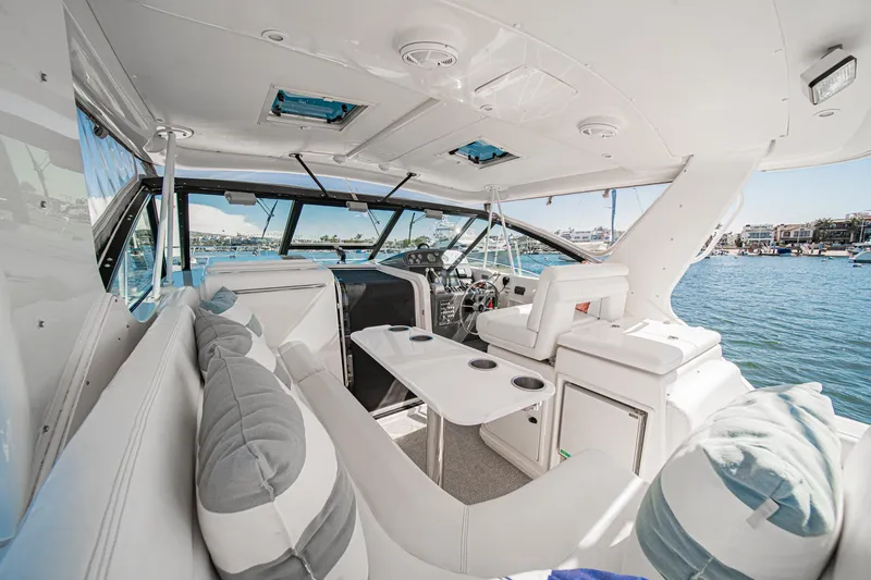 Slide: The Image of Interior of 2001 Tiara Yachts 3500 Open, featuring luxurious seating and ocean view. - 24