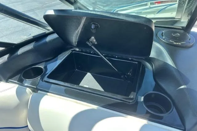 Slide: The Image of Open storage compartment in 2003 Malibu Wakesetter VLX boat interior. - 23