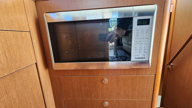 Slide: The Image of Cuisinart microwave in 2015 Beneteau Swift Trawler 34 kitchen interior. - 24