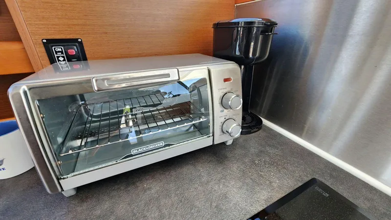 Slide: The Image of Toaster oven and coffee maker on Beneteau Swift Trawler 34, 2015 model kitchen counter. - 26