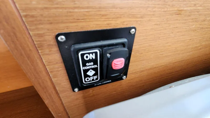 Slide: The Image of Gas control switch on 2015 Beneteau Swift Trawler 34, featuring on/off settings. - 27